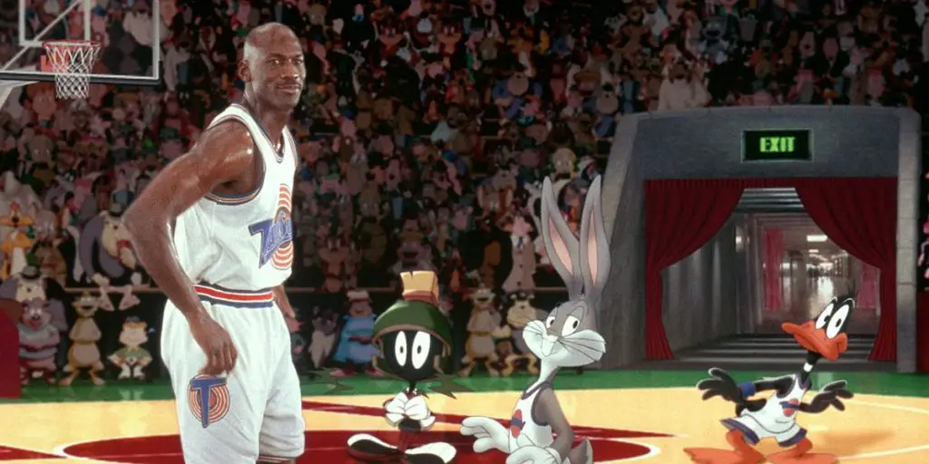 Michael Jordan in Space Jam next to Looney Tunes characters