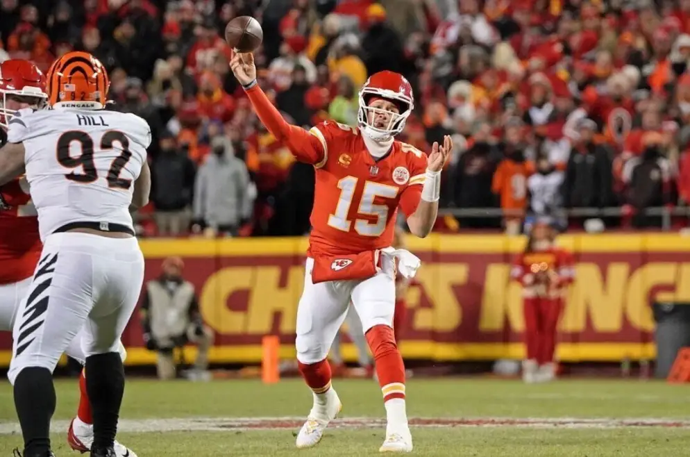 Patrick Mahomes throwing the ball in the NFL Conference Game against the Bengals to make it to Super Bowl LVII
