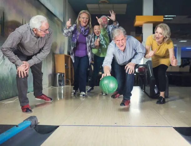 Senior's have fun while bowling showing it is never too late to pick up a sport