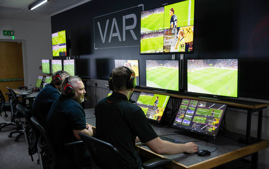 VAR room with the Video Assistant Referees watching a game
