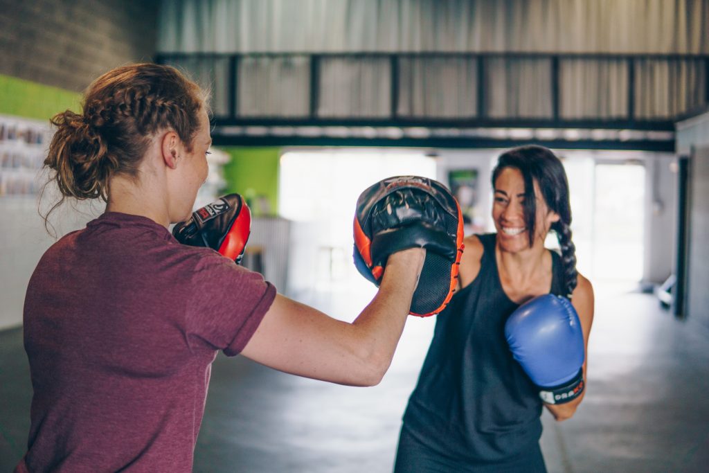 Two female boxers training