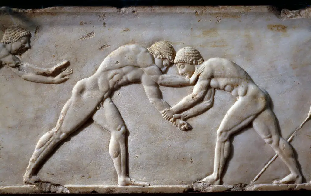 Wrestlers, decorative detail from stele depicting a wrestling match between athletes, ca 510 BC, from the Kerameikos cemetery, Athens, Greece. Greek civilisation, 6th century BC. Showing Wrestling to be one of the oldest sports in the world.