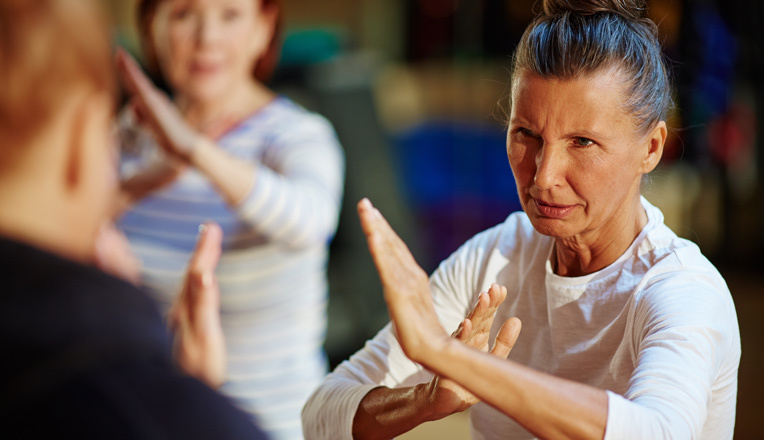 Senior women partaking in Krav Maga