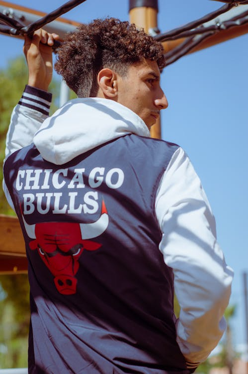 Man wearing hoodie with Chicago Bulls logo
